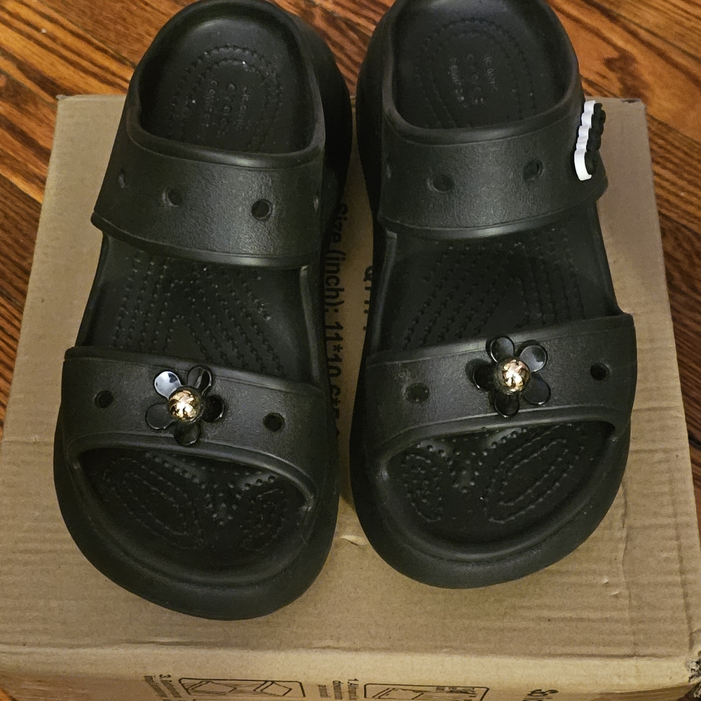 CROCS Black Mules with Gold Flower Accent